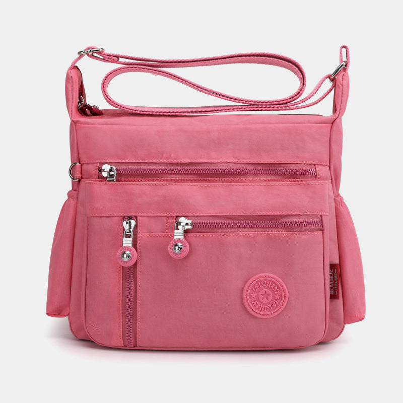 Large Capacity Multi-Pocket Waterproof Lightweight Casual Crossbody Bag - LightCoral - image 0