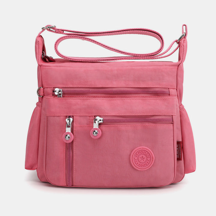 Large Capacity Multi-Pocket Waterproof Lightweight Casual Crossbody Bag - LightCoral - image 0